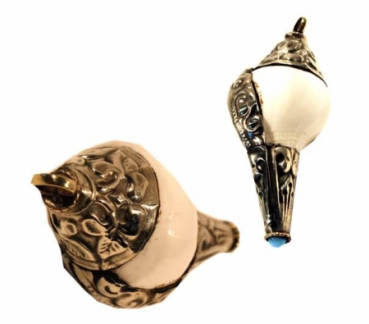 Ritual shell with white metal